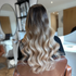 woman with balayage from dark to blonde