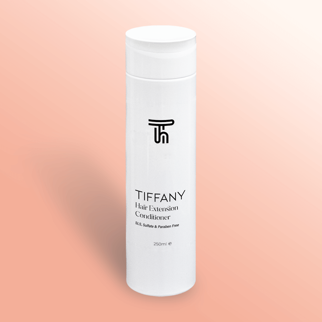 hair extension conditioner from Tiffany hair on gradient pink background