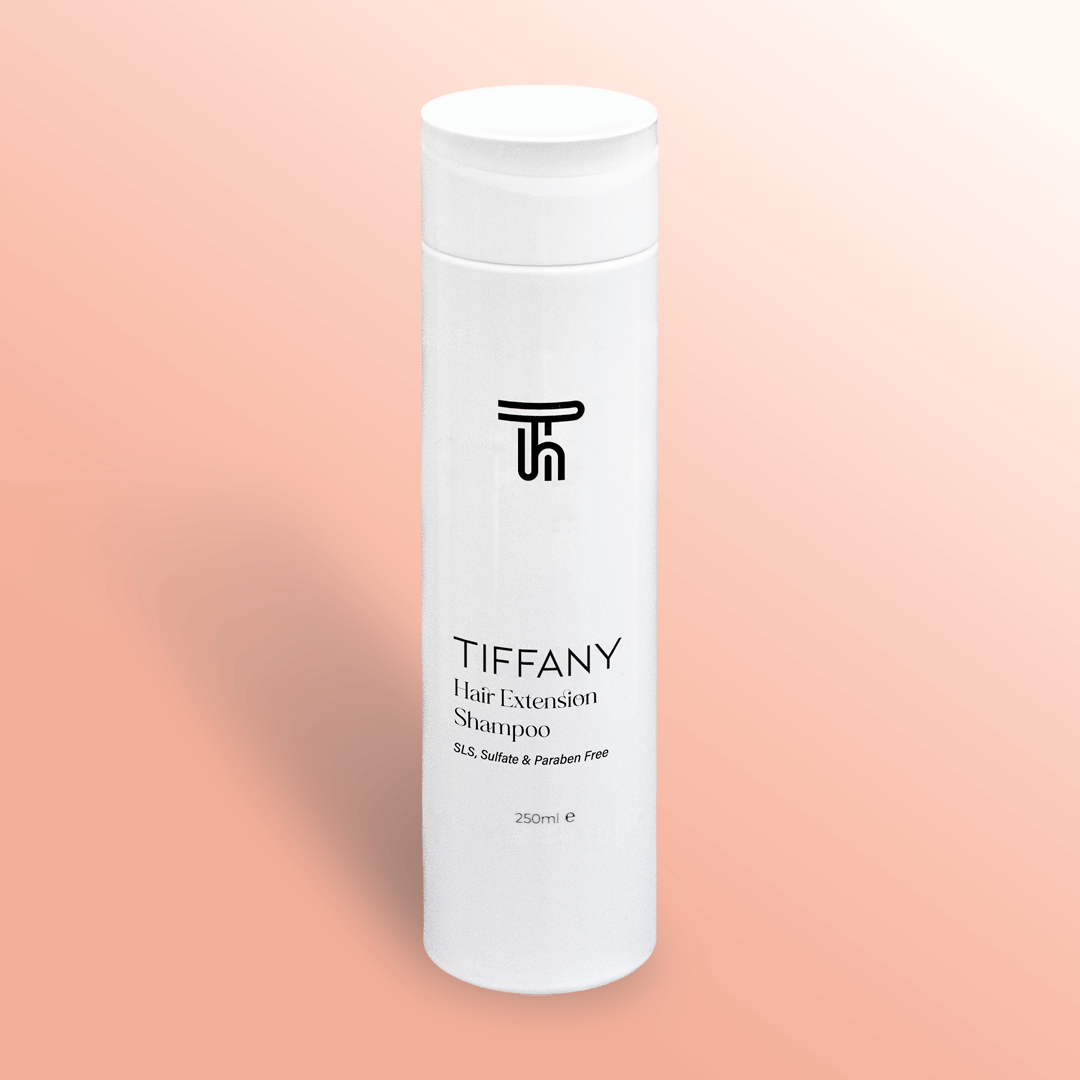 Hair Extensions shampoo by Tiffany hair on a pink gradient background