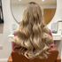 woman with deep wave style balayage hair