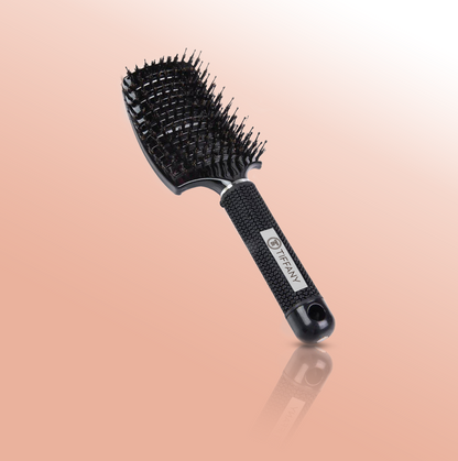 Tiffany hair boar bristle vent brush in black on a pink gradient background